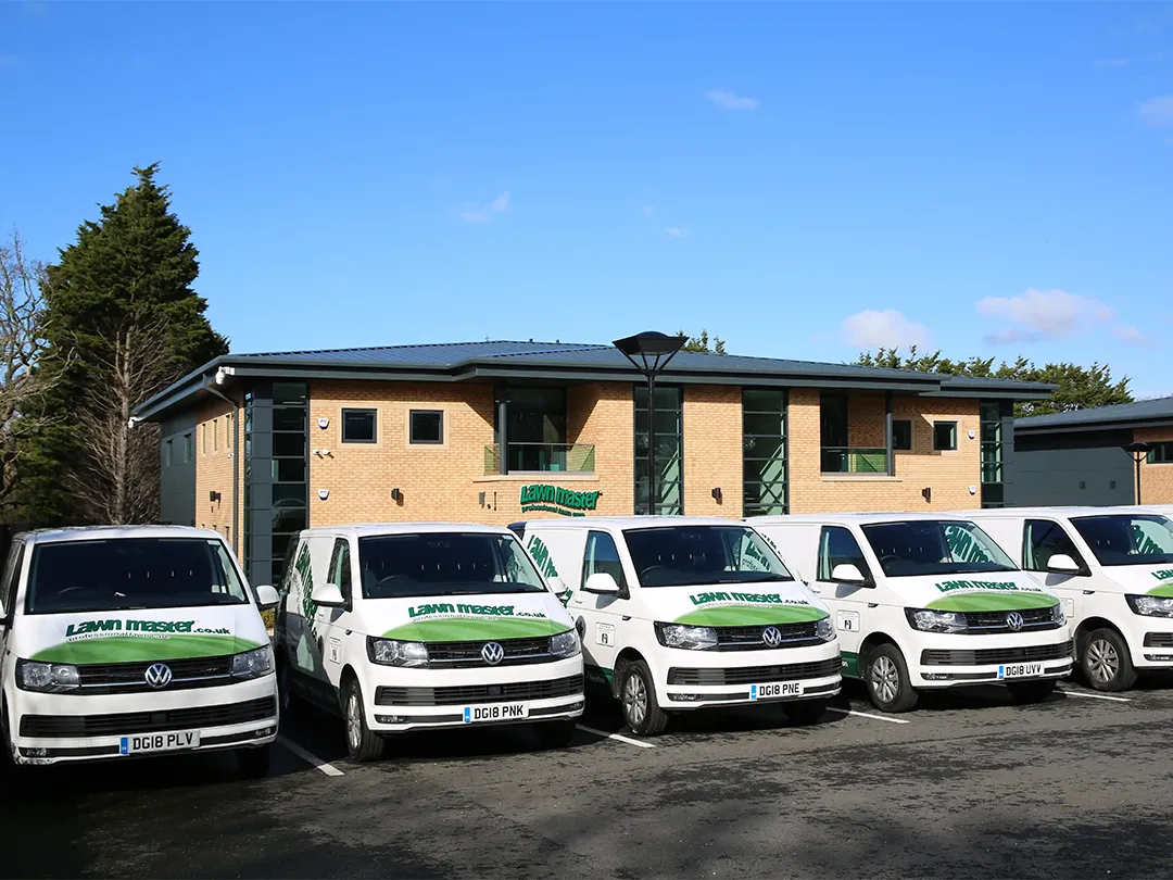 Parked lawn master vans.webp